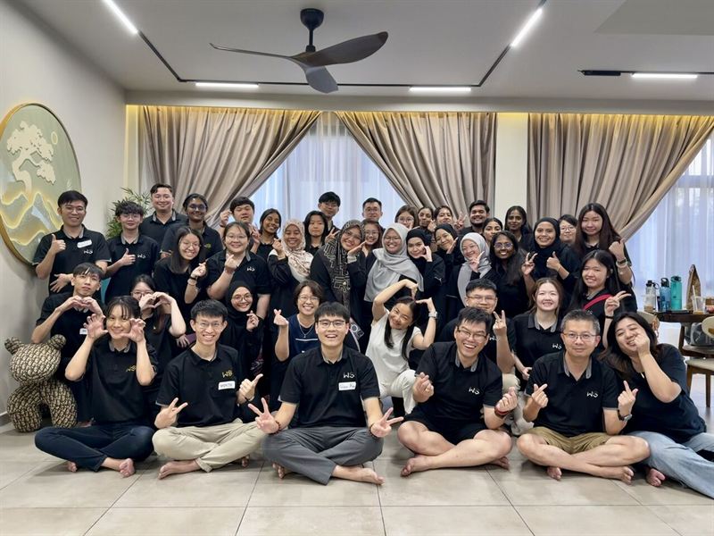 WS Group team in company shirts at a firm event